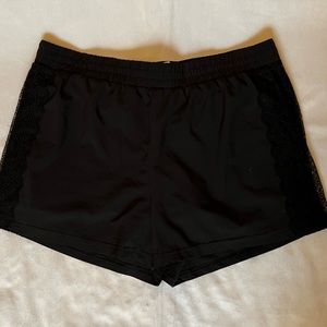 Fabletics fully lined lace trim black athletic shorts